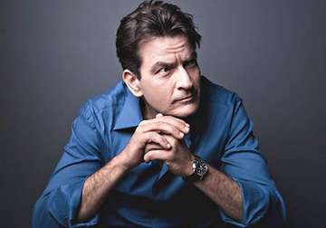 charlie sheen wants wife children to vacate his house