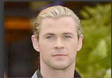 chris hemsworth s daughter likes surfboards