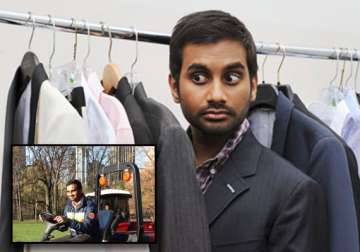 comedian aziz ansari mows lawn in central park