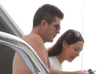 cowell gifts bangle to lauren