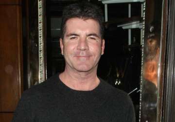 cowell supports charity tea party