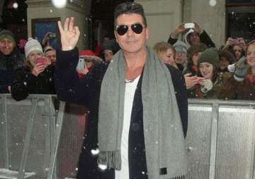 cowell wants my way... to be played at his funeral