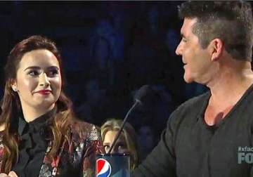 demi lovato not afraid of making simon cowell angry