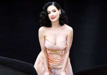 dita von teese strips off in racy new renault clio tv commercial