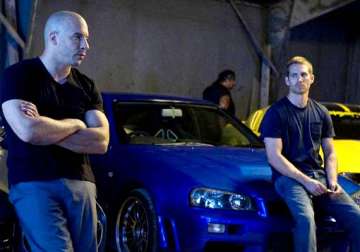 fast and furious 7 resumes production after paul walker s death