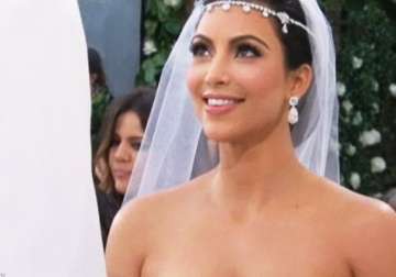 first look at beaming bride kim kardashian at wedding