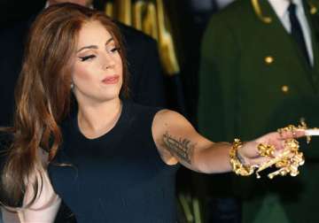 gaga to pay for assistant s cancer treatment