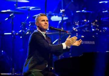 harry styles to pen song with gary barlow