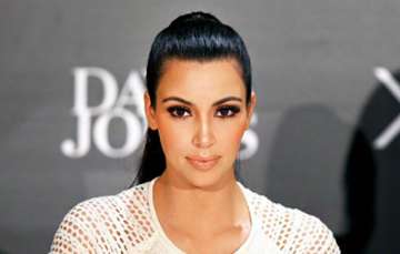 kim kardashian denies pregnancy reports