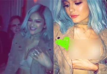 kylie jenner flaunts ample cleavage while partying