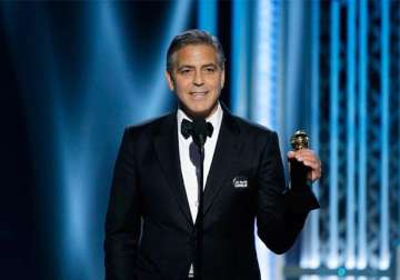 george cloooney experesses his love for wife on stage