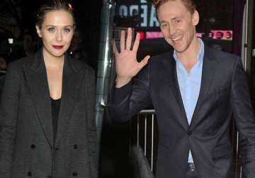 elizabeth olsen and tom hiddleston are