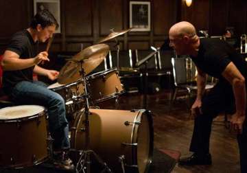 whiplash maker damien chazelle rues lack of original musicals in hollywood