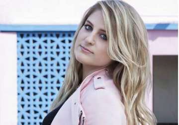 meghan trainor says she is single because guys are scared of her