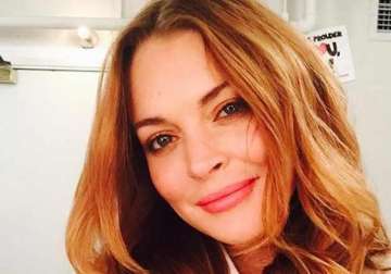 lindsay lohan jokes about her illness