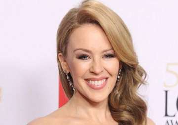 kylie minogue sparks engagement rumours