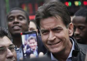 two and a half men star charlie sheen reveals he is hiv positive