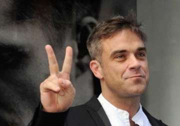 robbie williams plans to quit music for a proper job