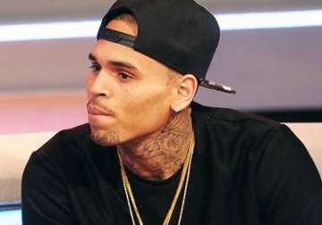 chris brown may be banned from australia due to past conviction