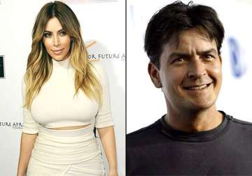 charlie sheen apologises to kim says he is an idiot