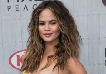 chrissy teigen poses nude for photoshoot