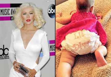 christina aguilera shares daughter s first picture