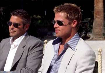 brad pitt george clooney raise a toast for their nuptials