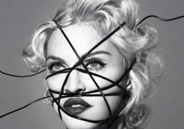 madonna defends altered photos of martin luther king jr. and mandela see pics
