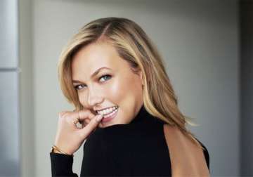 karlie kloss feels responsibility as a role model