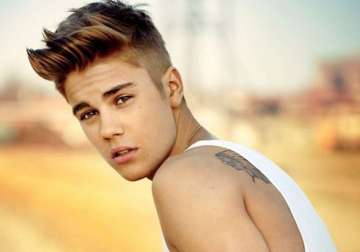 justin bieber apologises for nude photograph