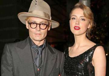 johnny depp amber heard s romance is in good place