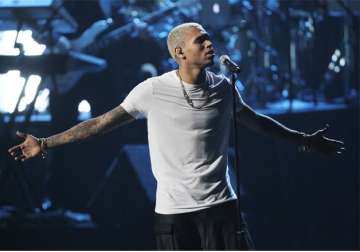 chris brown s performance interrupted by gunshots