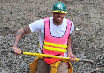 chris brown working too hard to complete community service