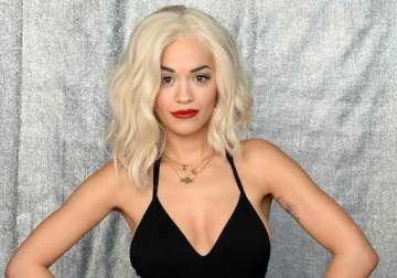 rita ora s busy schedule caused her break up with ricky hilfiger