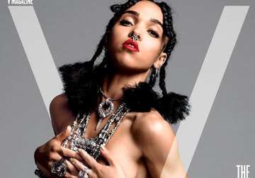 fka twigs poses topless