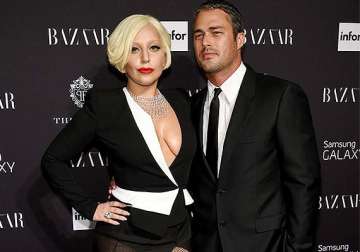 lady gaga attends event with beau