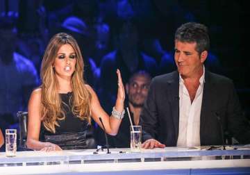 x factor judge cheryl says cowell is a genius