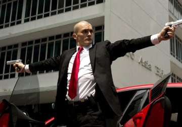 hitman agent 47 trailer rupert friend turns shaven headed assassin watch trailer