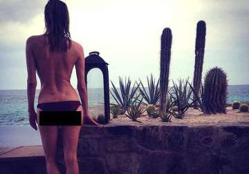 diane kruger flaunts figure in topless image
