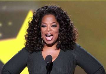 having children would have held her back says oprah winfrey