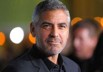 george clooney s back pain continues