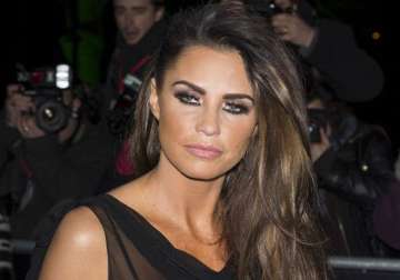 katie price plans to sell old breast implants for charity
