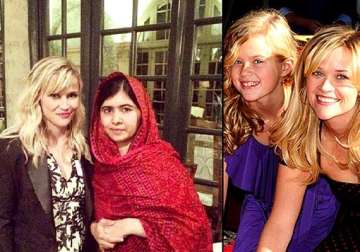 reese witherspoon s daughter in awe of malala yousafzai