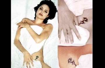 angelina jolie s mystery tattoo after crazy night out