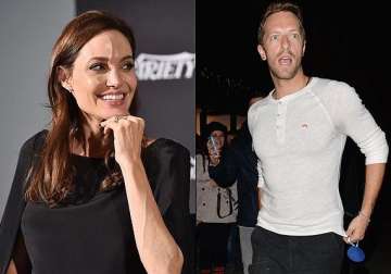 angelina jolie kidnapped me to write a song chris martin
