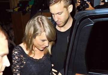 taylor swift caught leaving house with harris