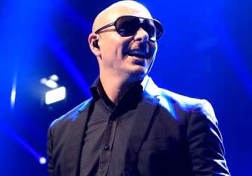 pitbull to host 2014 american music awards