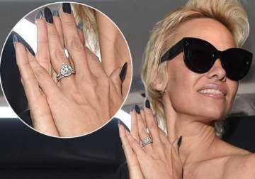 pamela anderson auctions engagement ring from ex husband