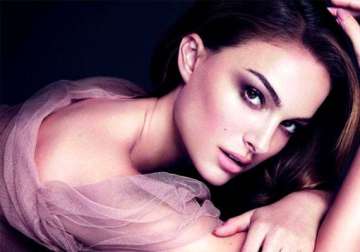 natalie portman honoured to be face of dior