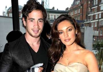 kelly brook s former beau to sue her